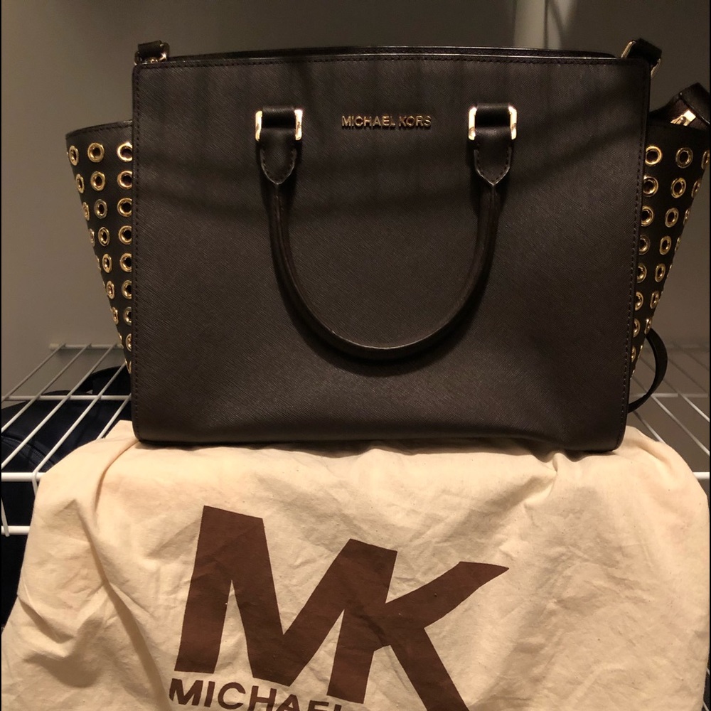 MK purse Brown with gold accents. 13by 11 inches.